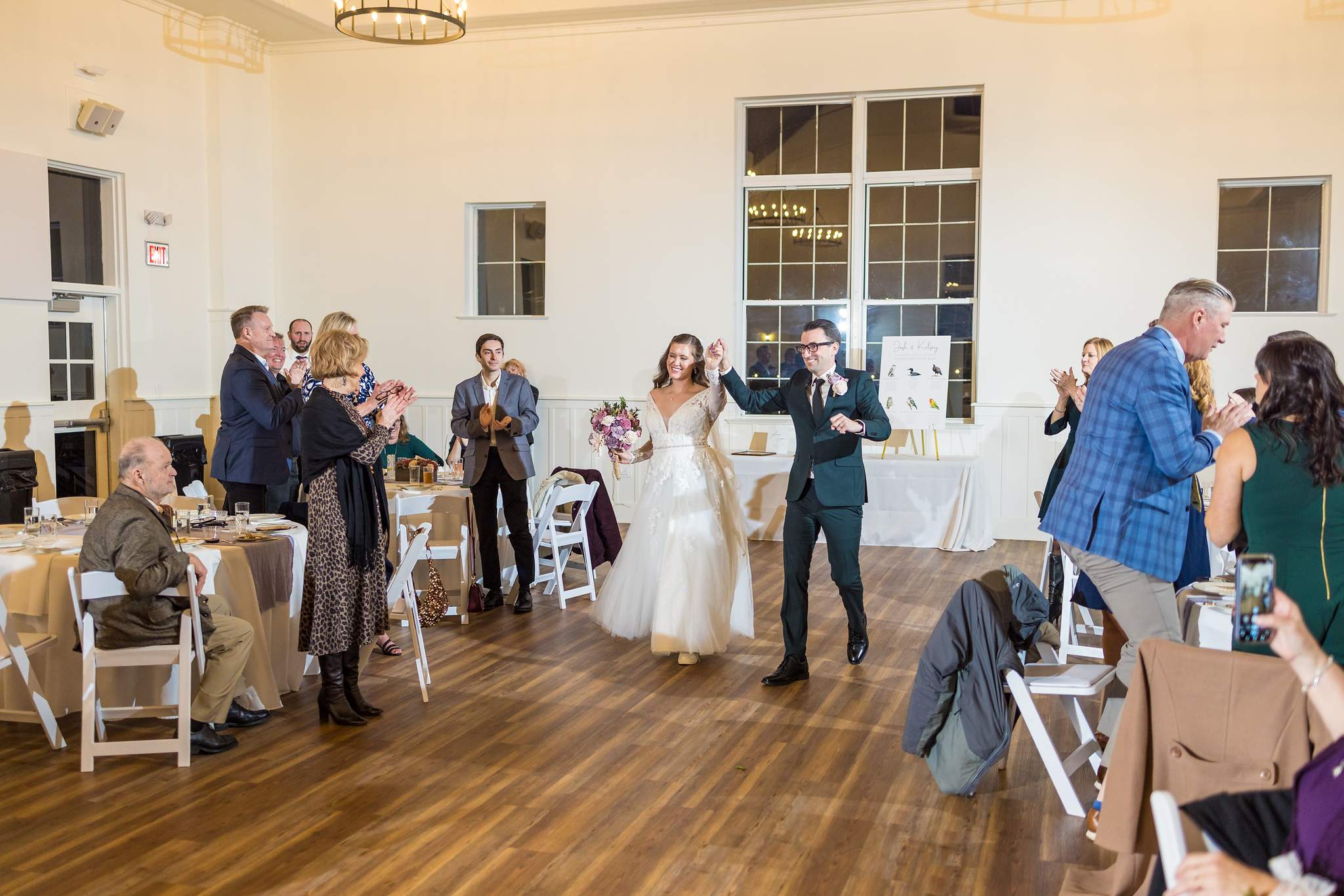 Couple making their grand entrance at a 240 Glynn Street reception