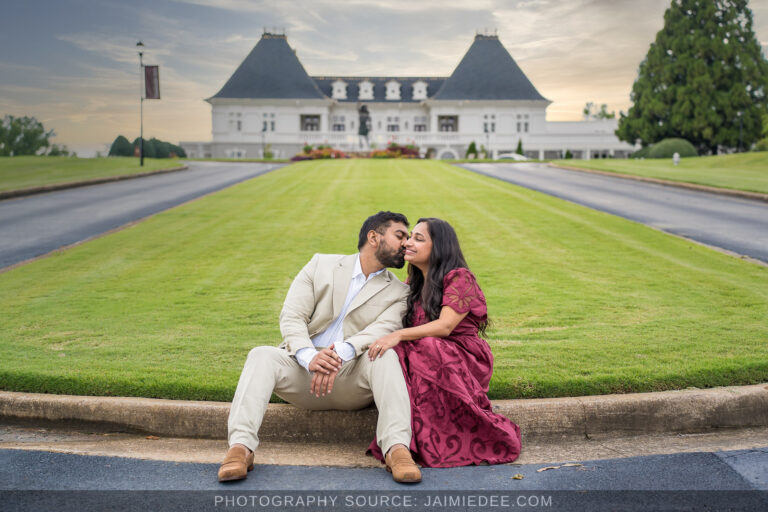 Couple on the lawn in front of the Chateau Elan winery Couple on the lawn in front of the Chateau Elan winery