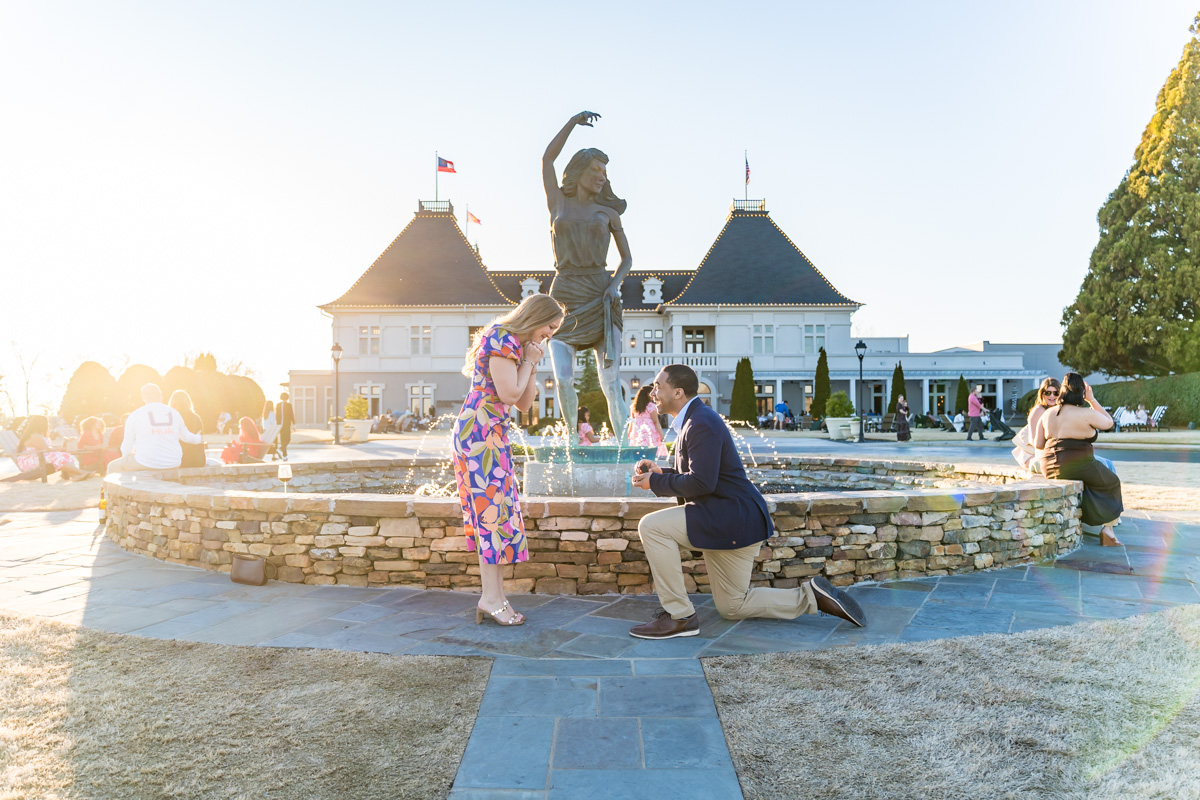 Chateau Elan Proposal in front of statue at front of venue