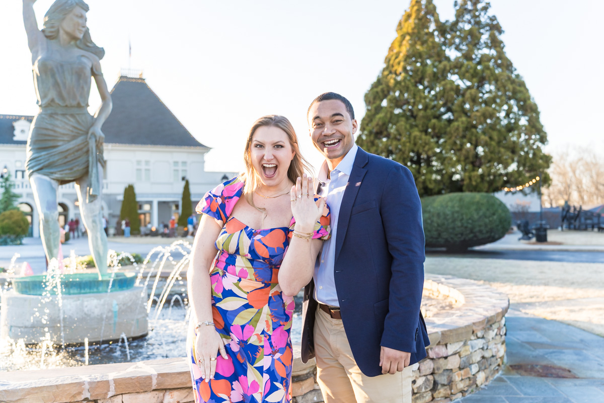 Chateau Elan Proposal in front of statue at front of venue