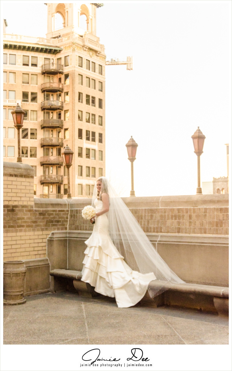 Bride in a long veil on a rooftop terrace in Midtown Atlanta
