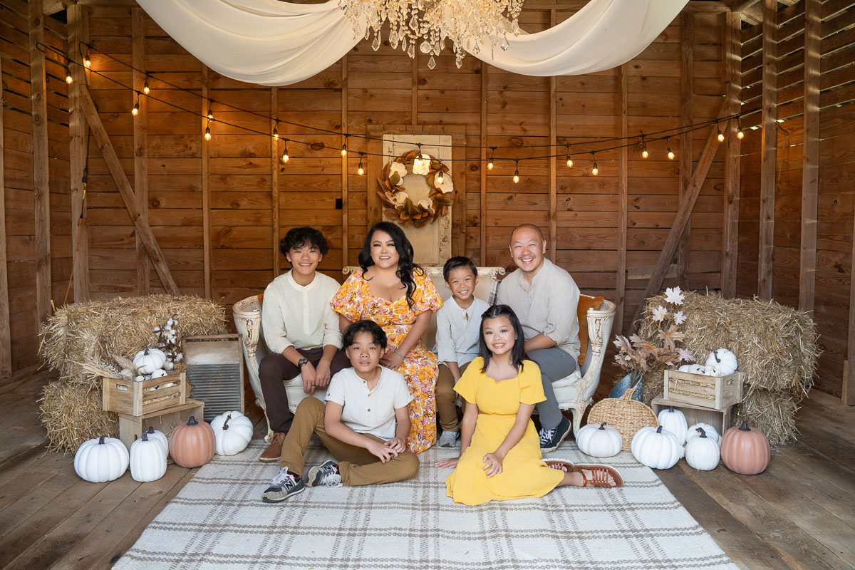 family fall mini sessions - white pumpkin barn at Prospect Farms