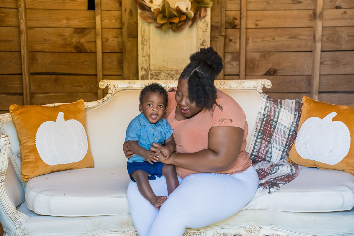 family fall mini sessions - white pumpkin barn at Prospect Farms with mother and son