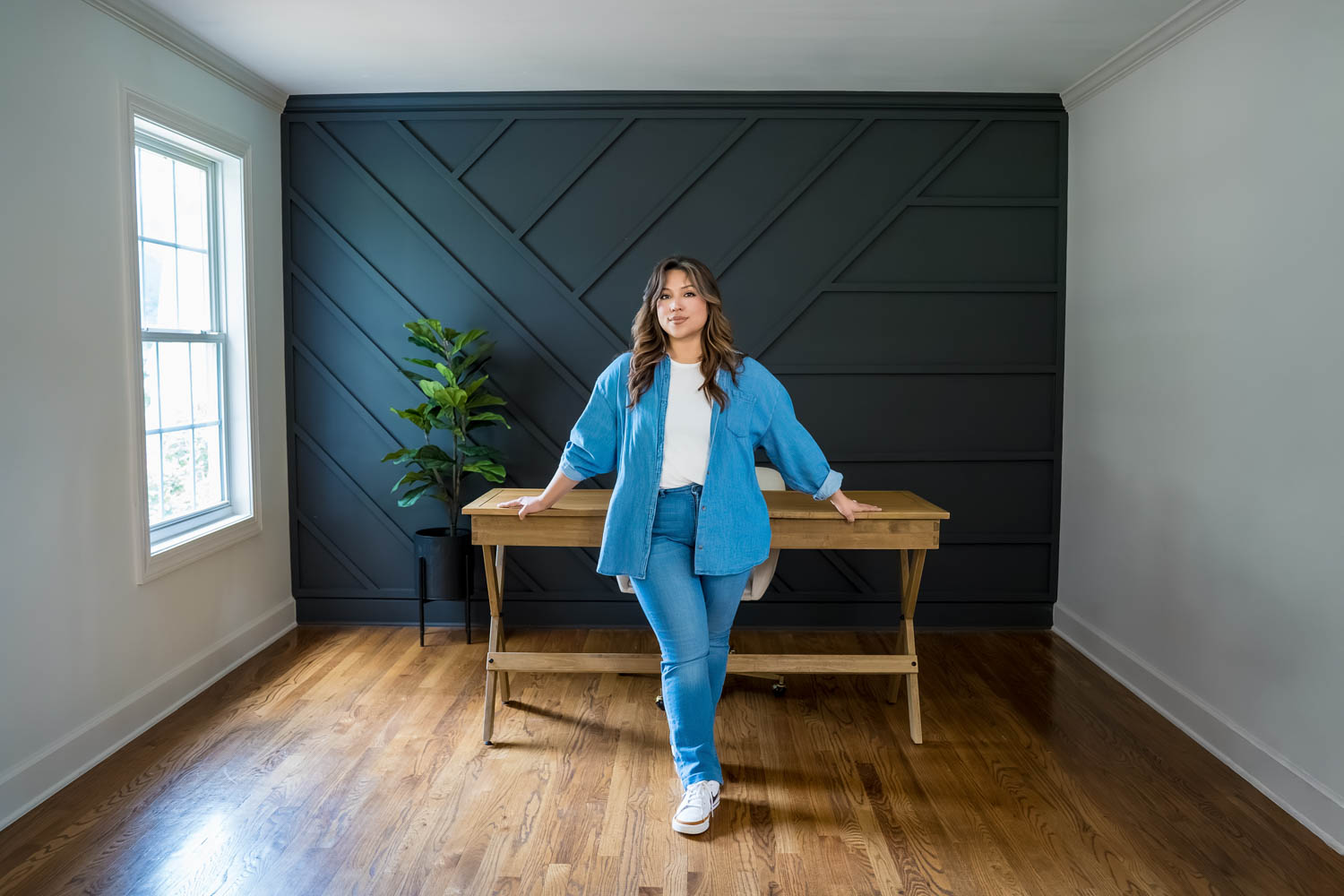 Personal Branding Photo in the Brand Room in front of the Black Trim Wall in the Farmhouse at Prospect Farms