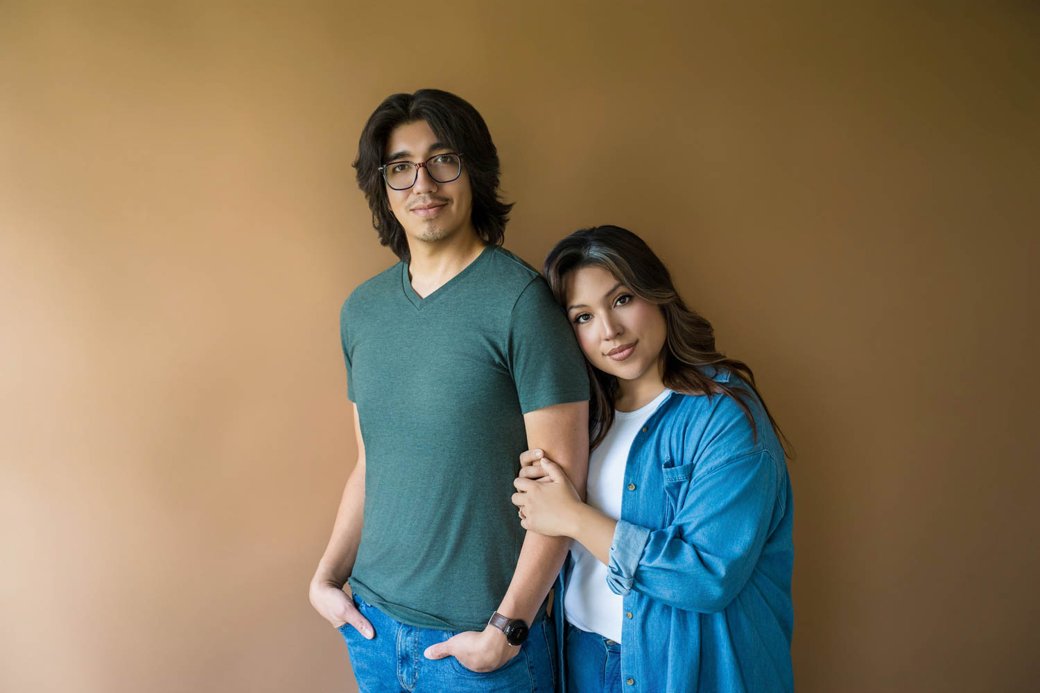 Couple Personal Branding Photo in the Create Room on tan mocha colored backdrop in the Farmhouse at Prospect Farms