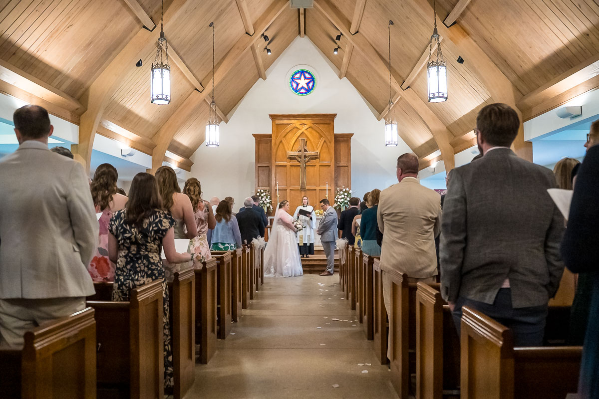 Camera on silent shutter mode capturing wedding ceremony with subtle banding at The Episcopal Church of the Epiphany