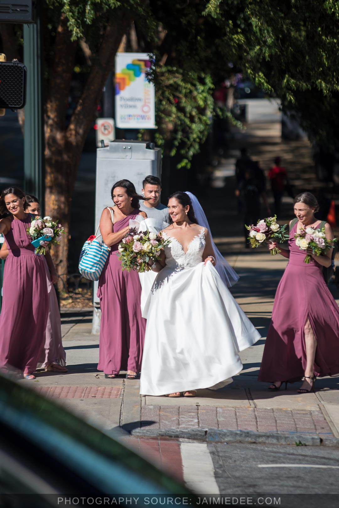 bride and bridesmaids crossing street in Atlanta