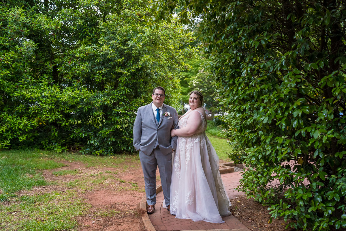 Outdoor green space photos of a couple on their wedding day at the Solarium at Historic Scottish Rite in Decatur (Atlanta)