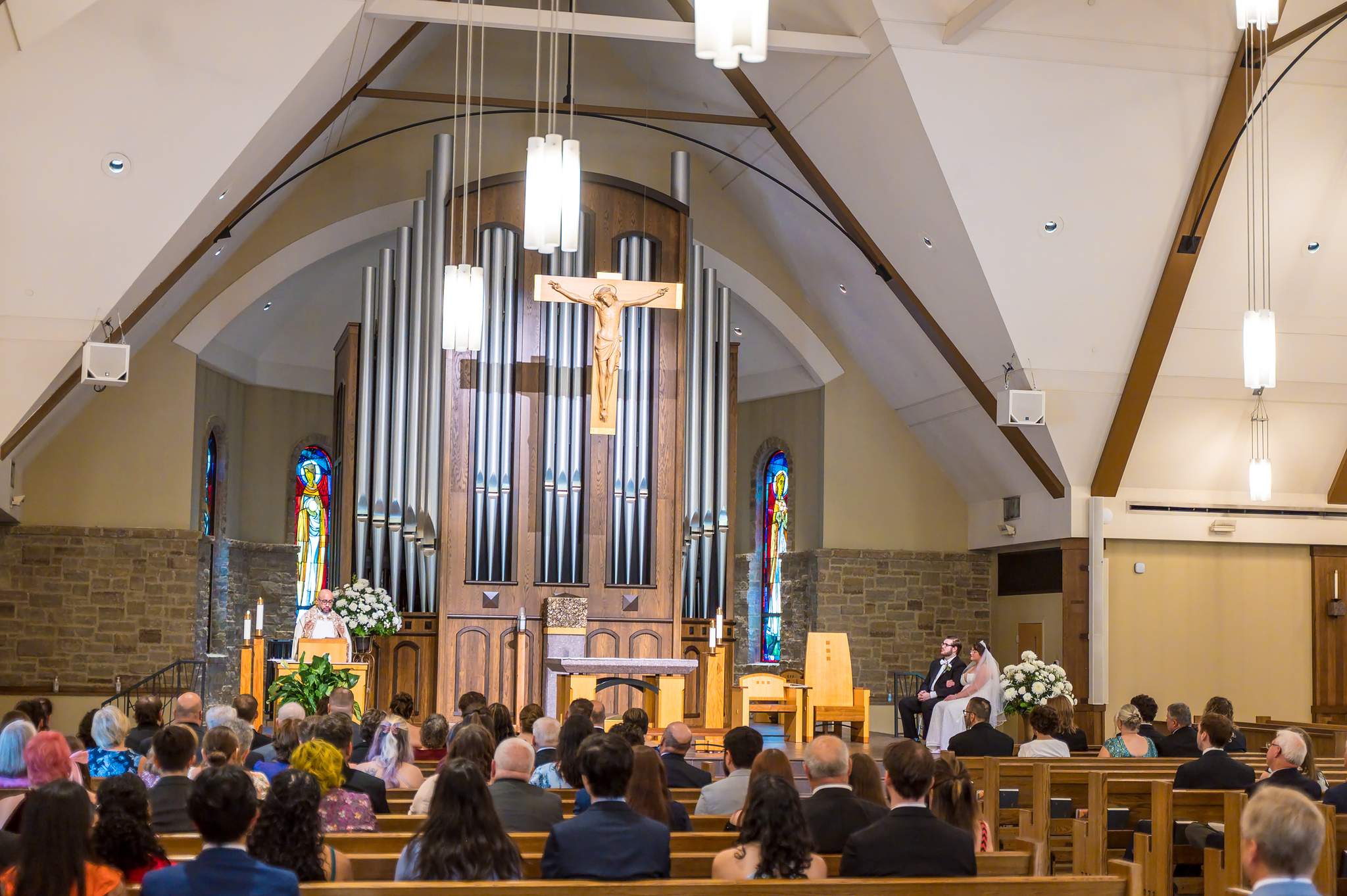 Ceremony at the altar under the pipe organ at Immaculate Heart of Mary in Atlanta