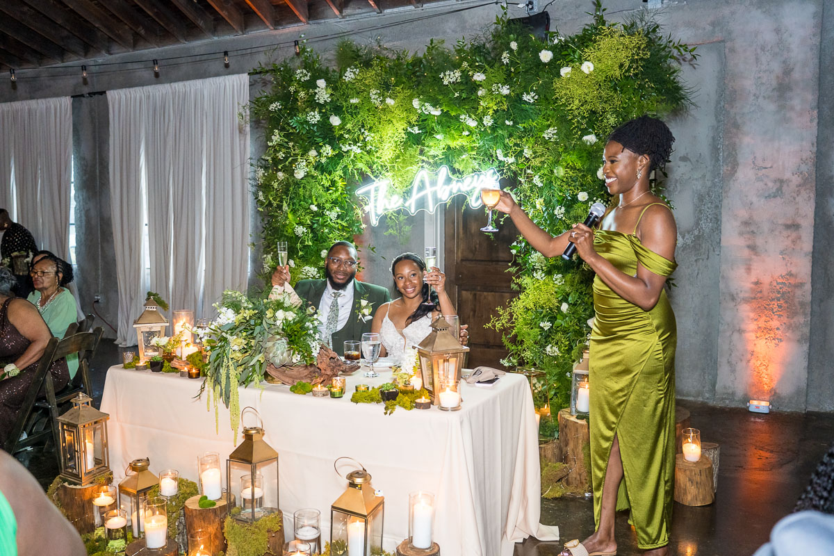 Black wedding photography at night in low light dark reception
