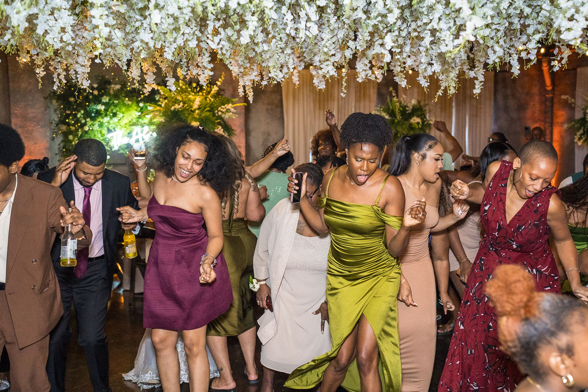 black wedding photography dark reception lighting