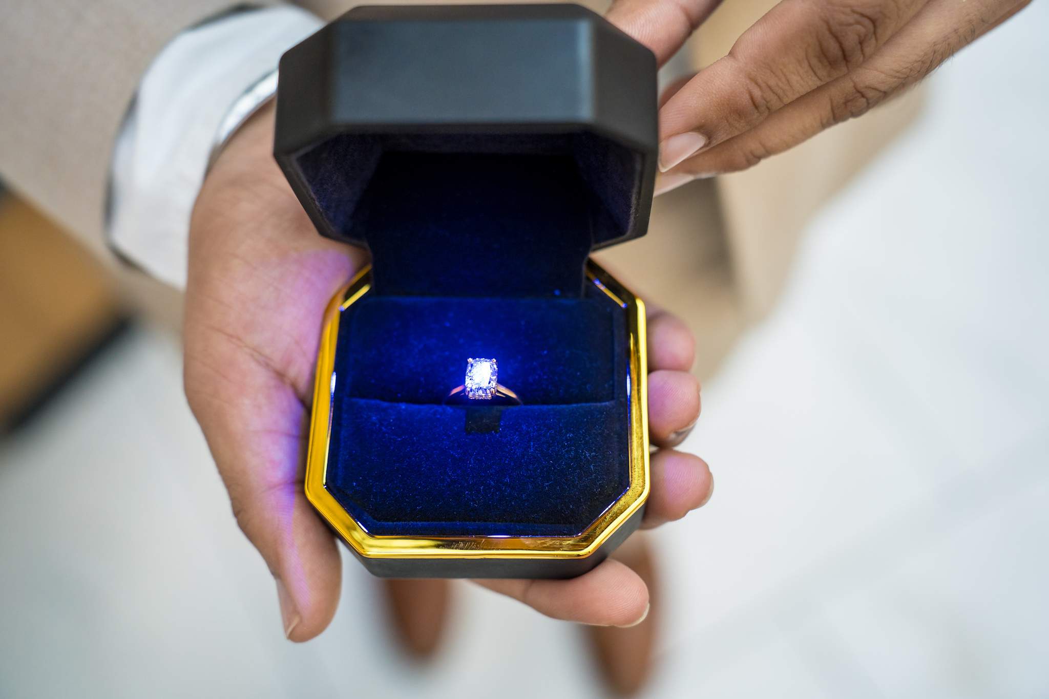 Open ring box with a sparkling engagement ring during a Chateau Elan proposal