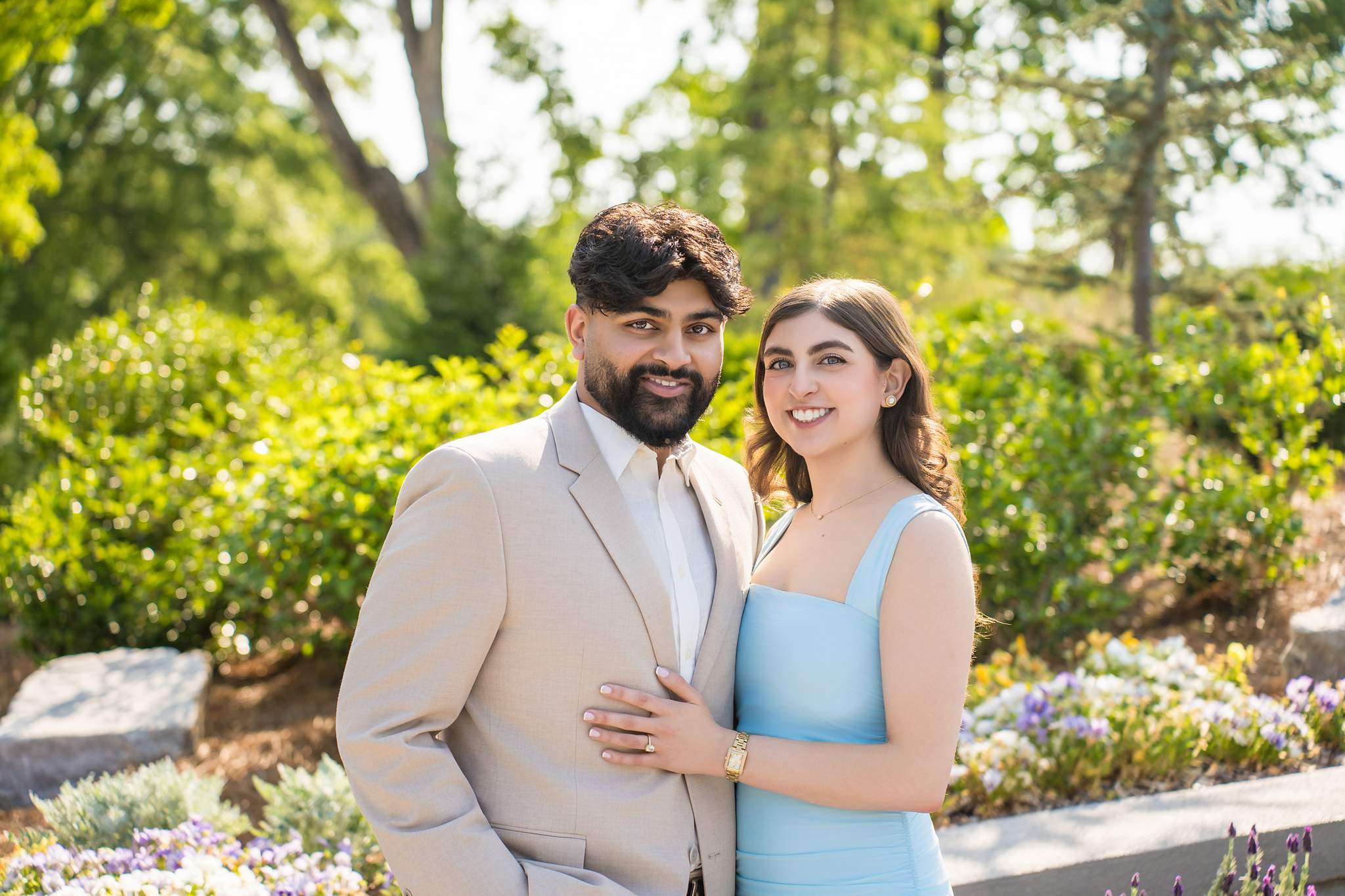 Newly engaged couple in the sunny gardens at Chateau Elan