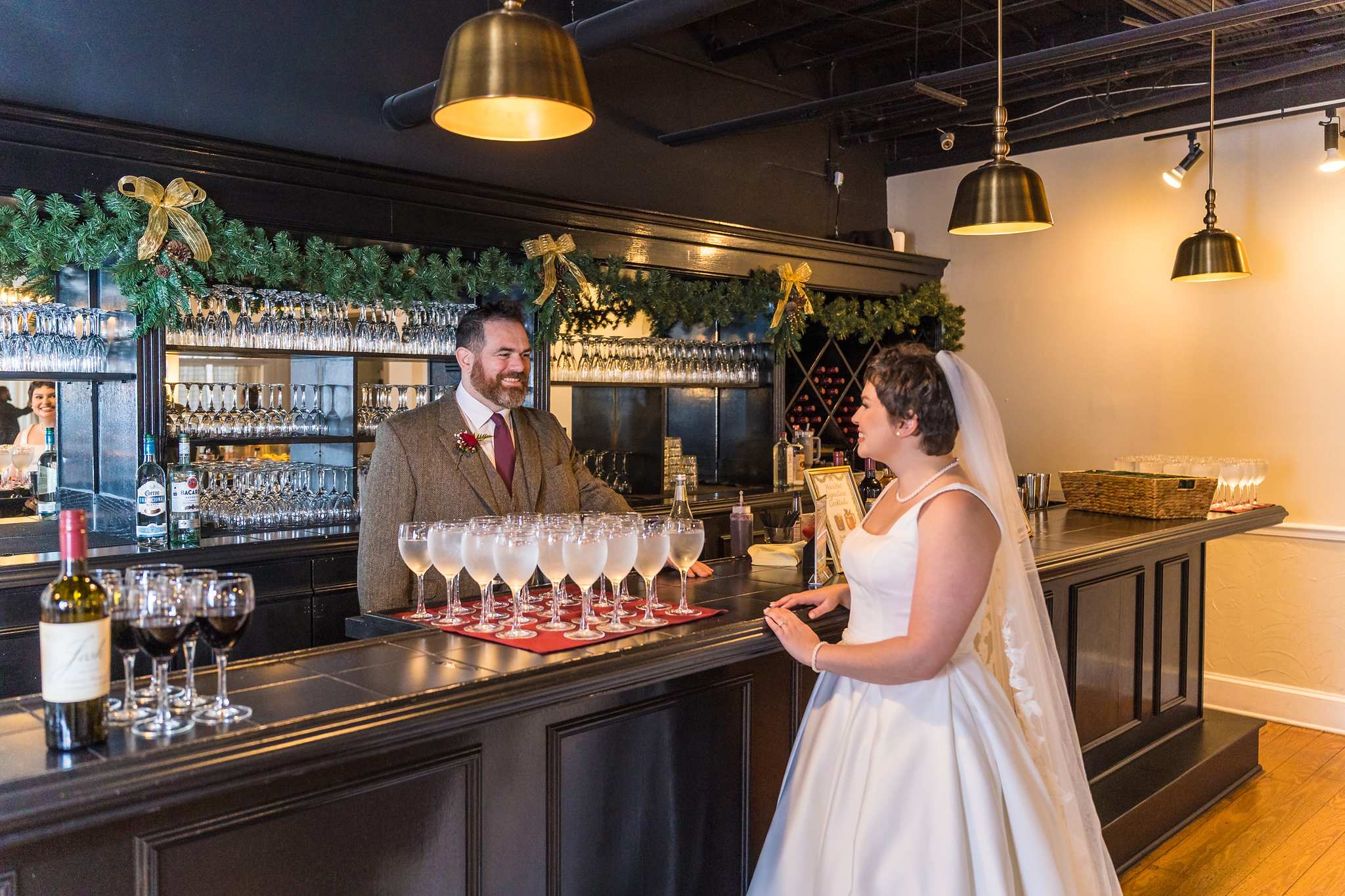 Bride at the bar during a Christmas wedding reception