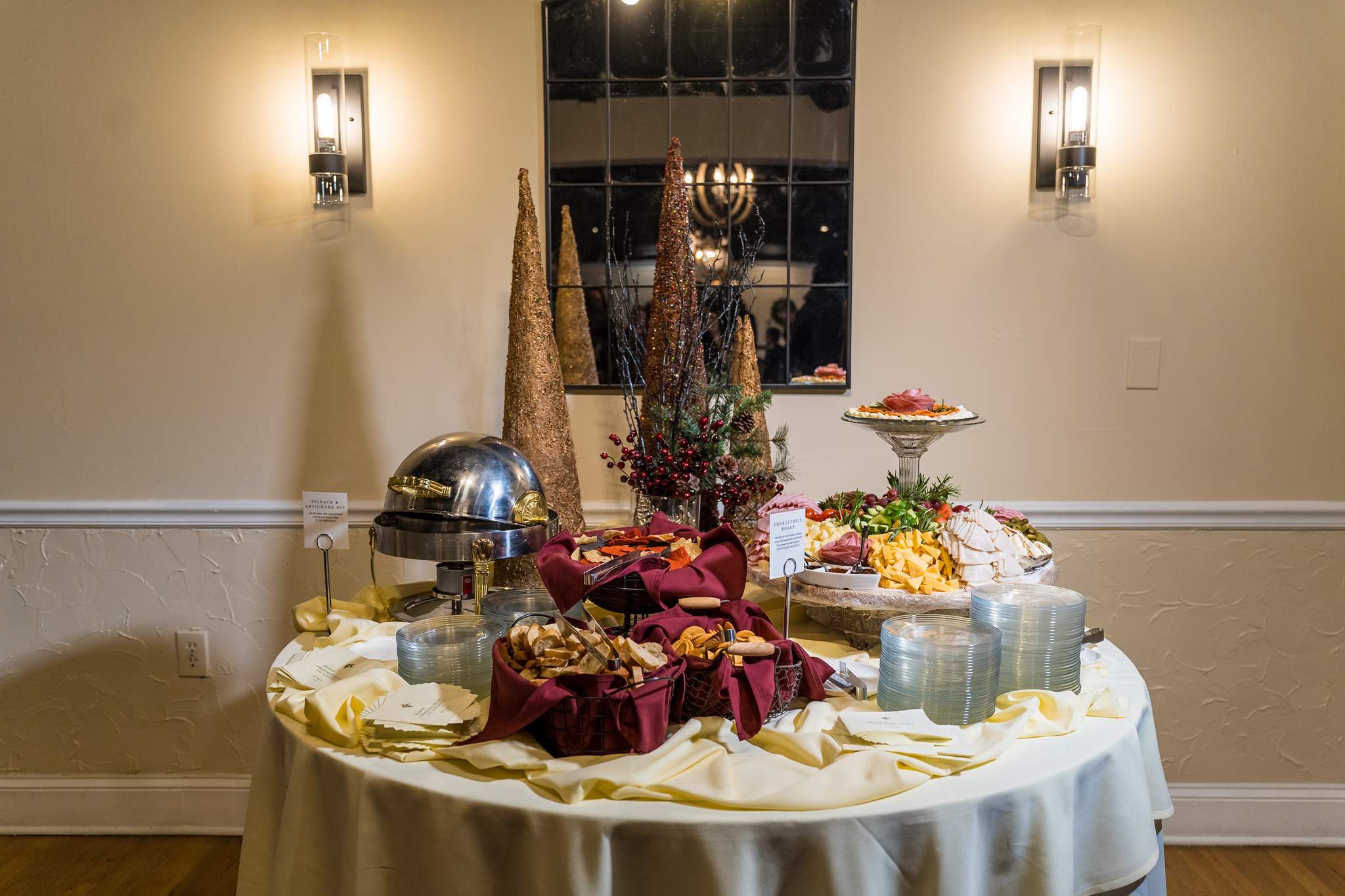 Dessert and appetizer table decorated for a Christmas wedding