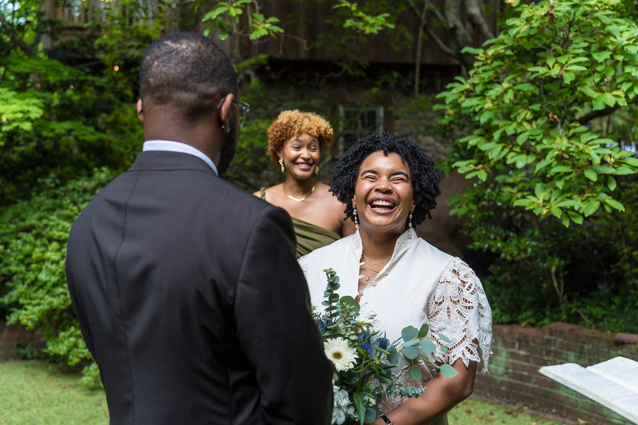 Bride laughing during her intimate elopement ceremony