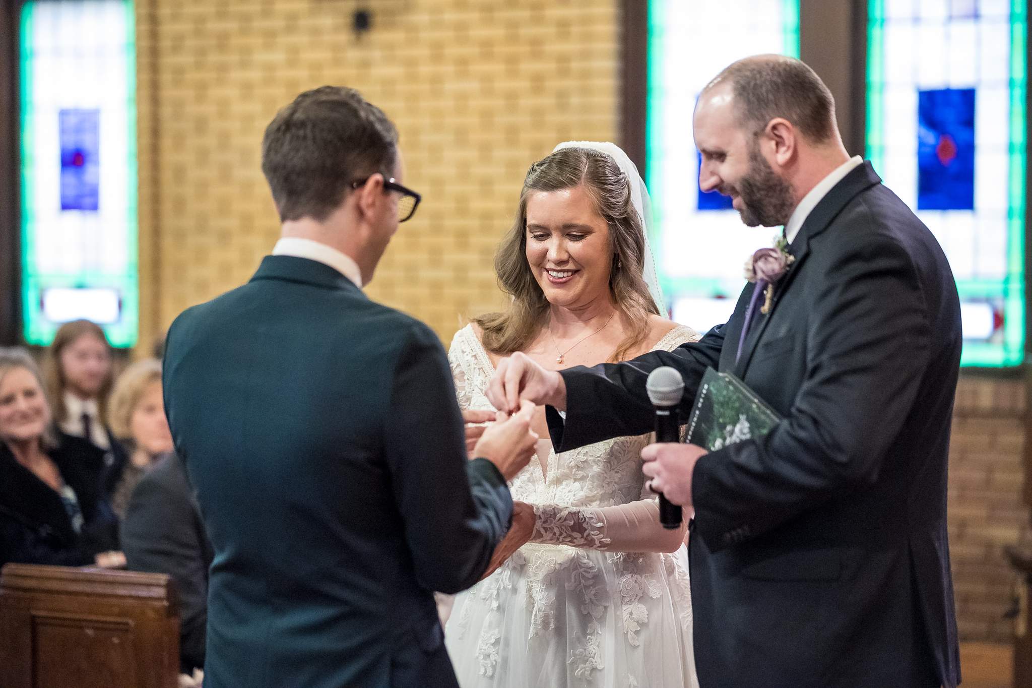 Ring exchange during a wedding at Fayetteville First United Methodist Church