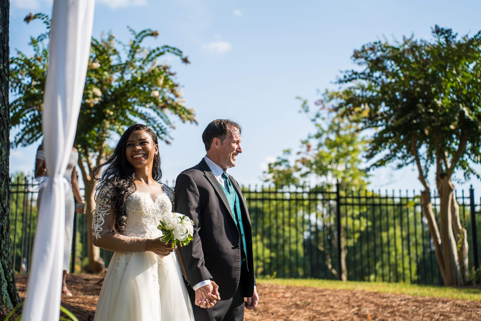 Bride smiling during an intimate outdoor wedding in Atlanta