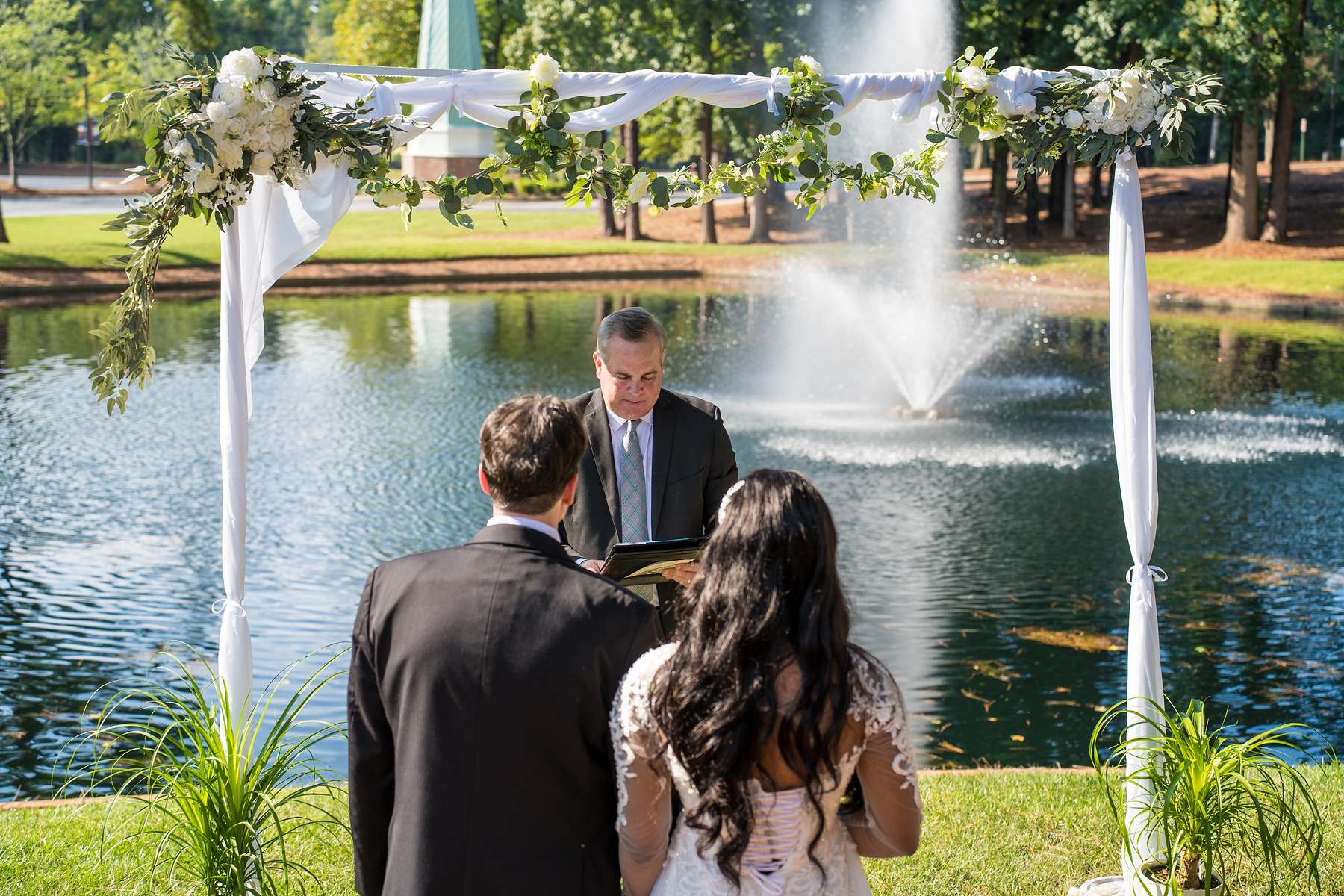 Outdoor wedding ceremony by the fountain at First Baptist Atlanta