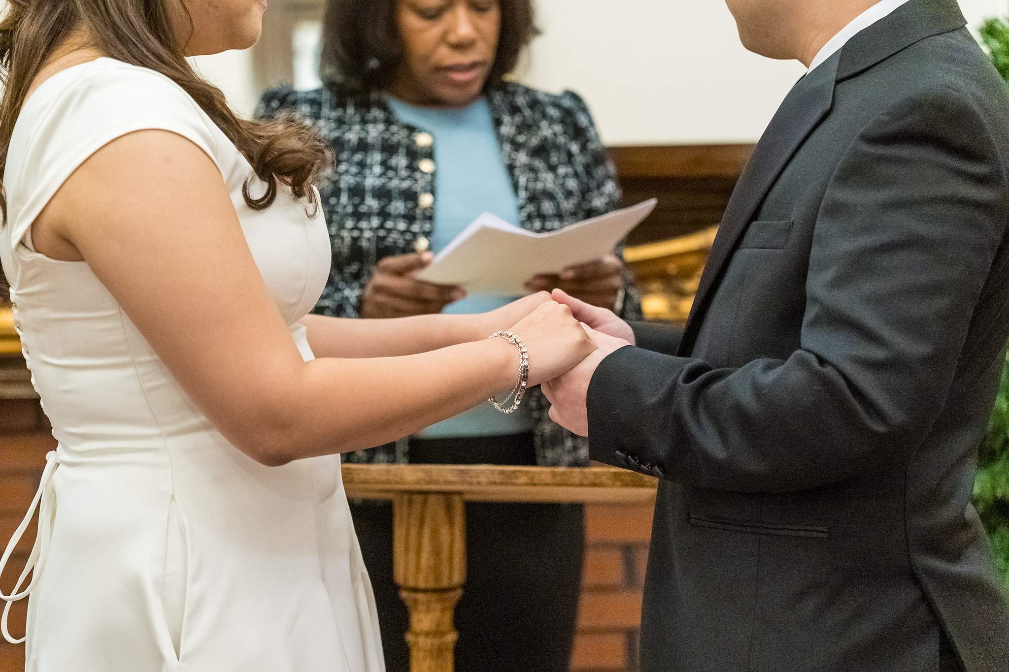 Close up of the ring exchange at a Gwinnett Historic Courthouse wedding ceremony