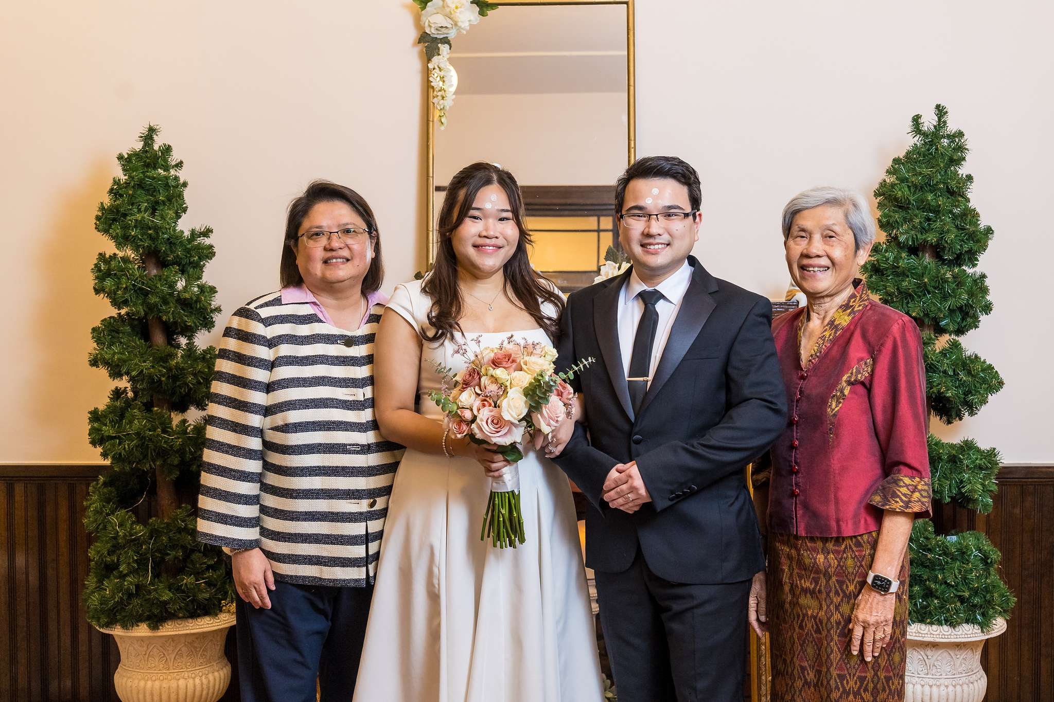 Family portrait with the couple inside the Gwinnett Historic Courthouse in Lawrenceville