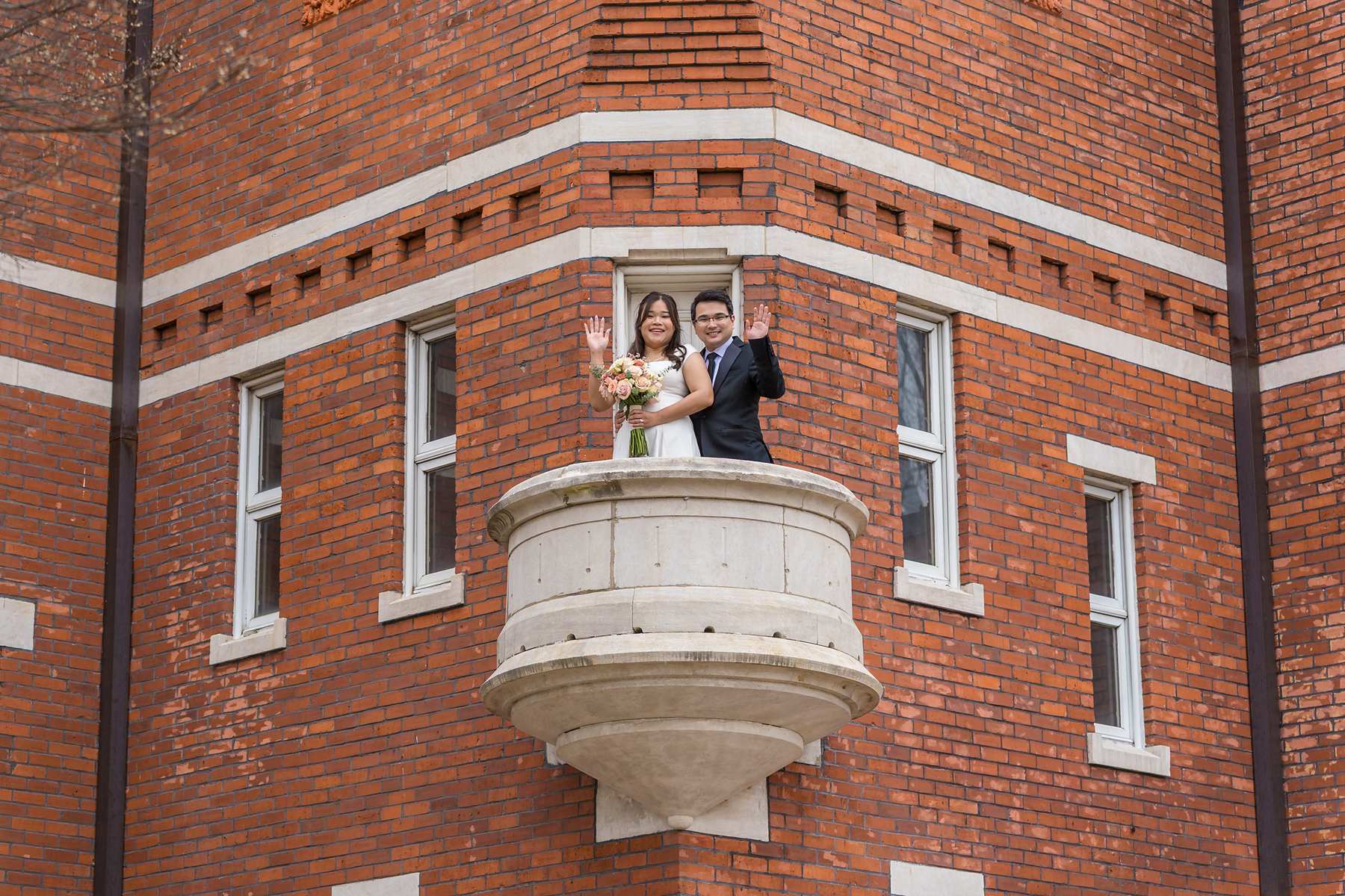 Couple on the turret balcony of the Gwinnett Historic Courthouse