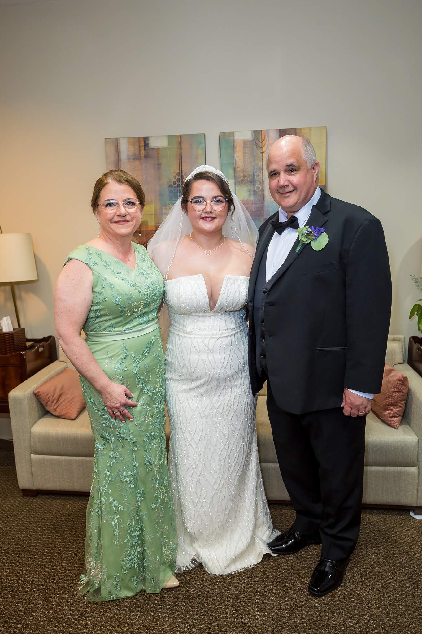 Bride with family before the ceremony at Immaculate Heart of Mary