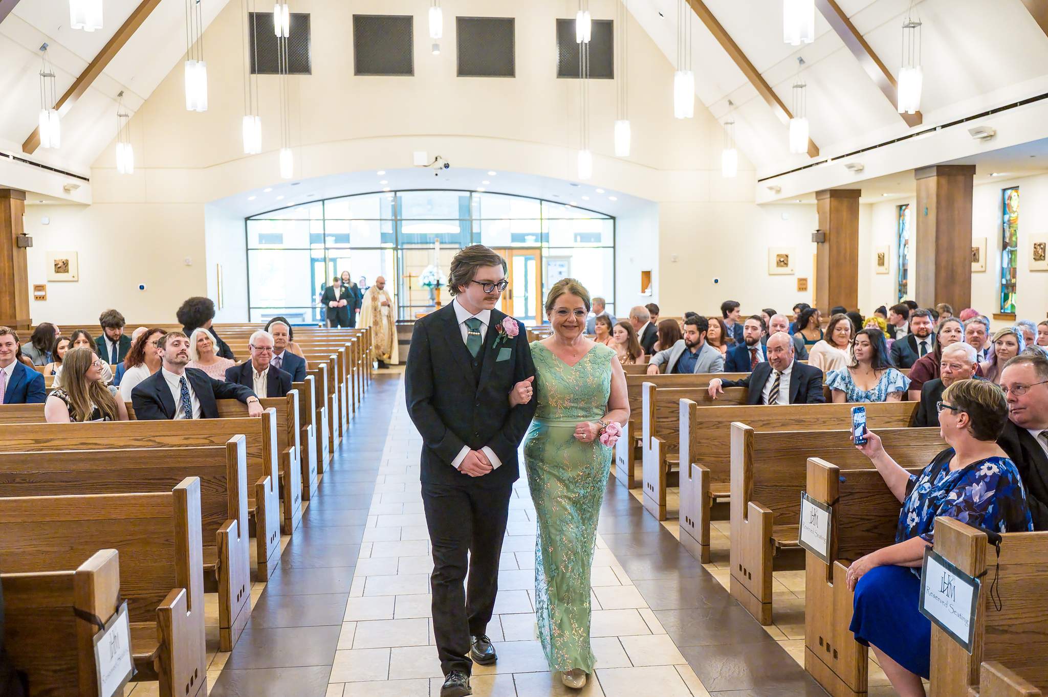 Wedding processional down the aisle at Immaculate Heart of Mary in Atlanta