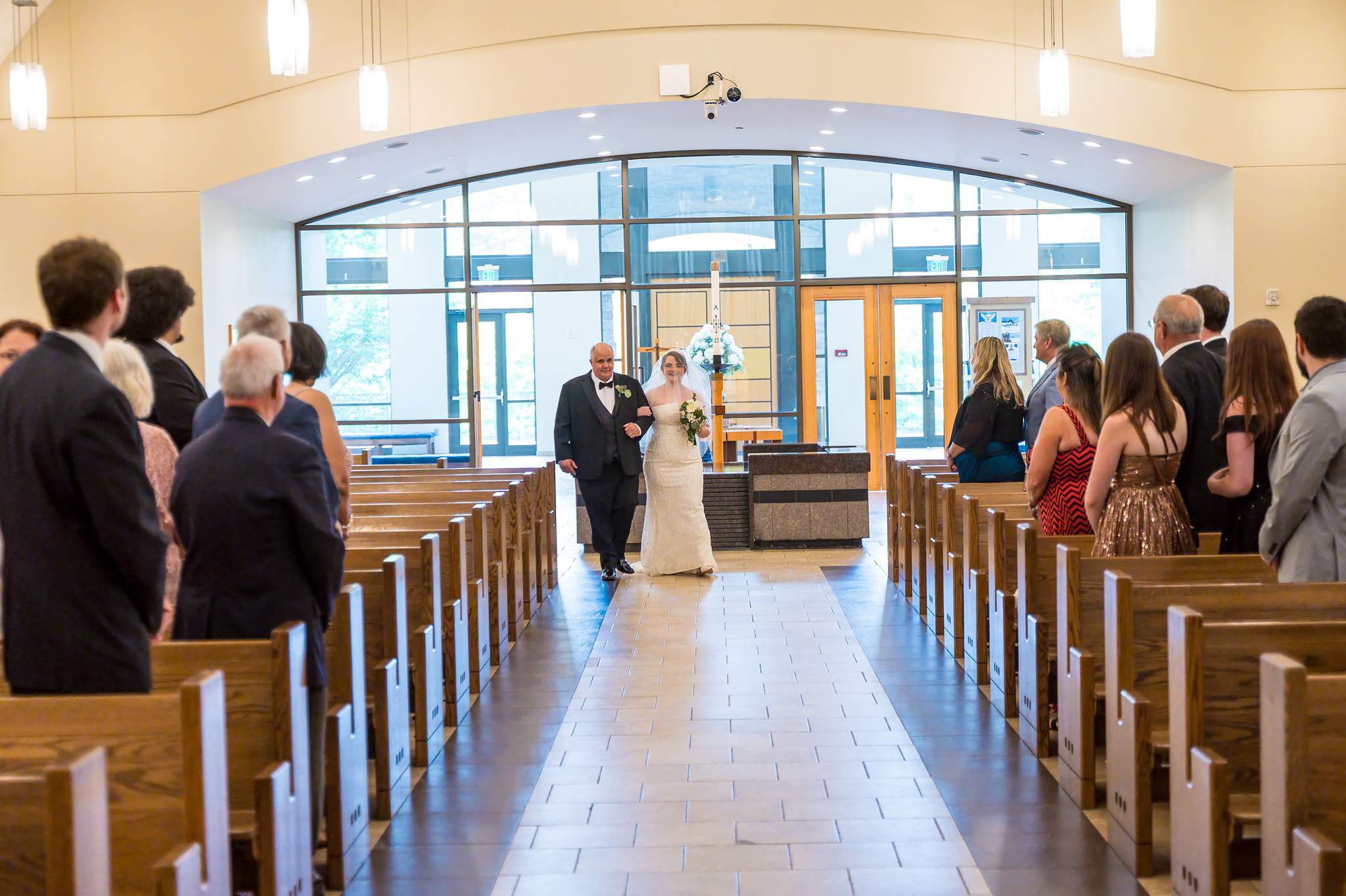 Bride entering the sanctuary for her ceremony at Immaculate Heart of Mary in Atlanta