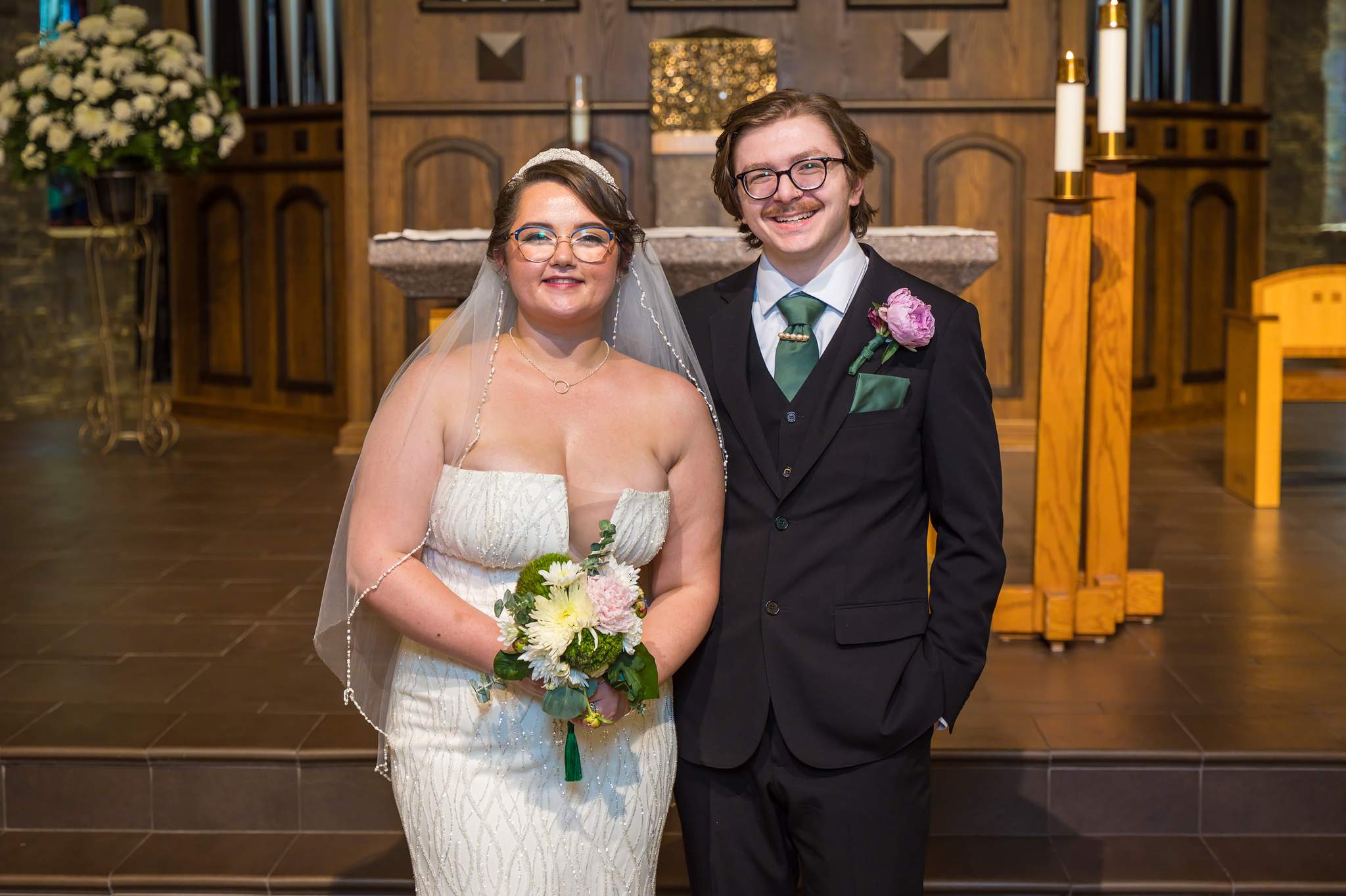 Couple portrait at the altar of Immaculate Heart of Mary in Atlanta