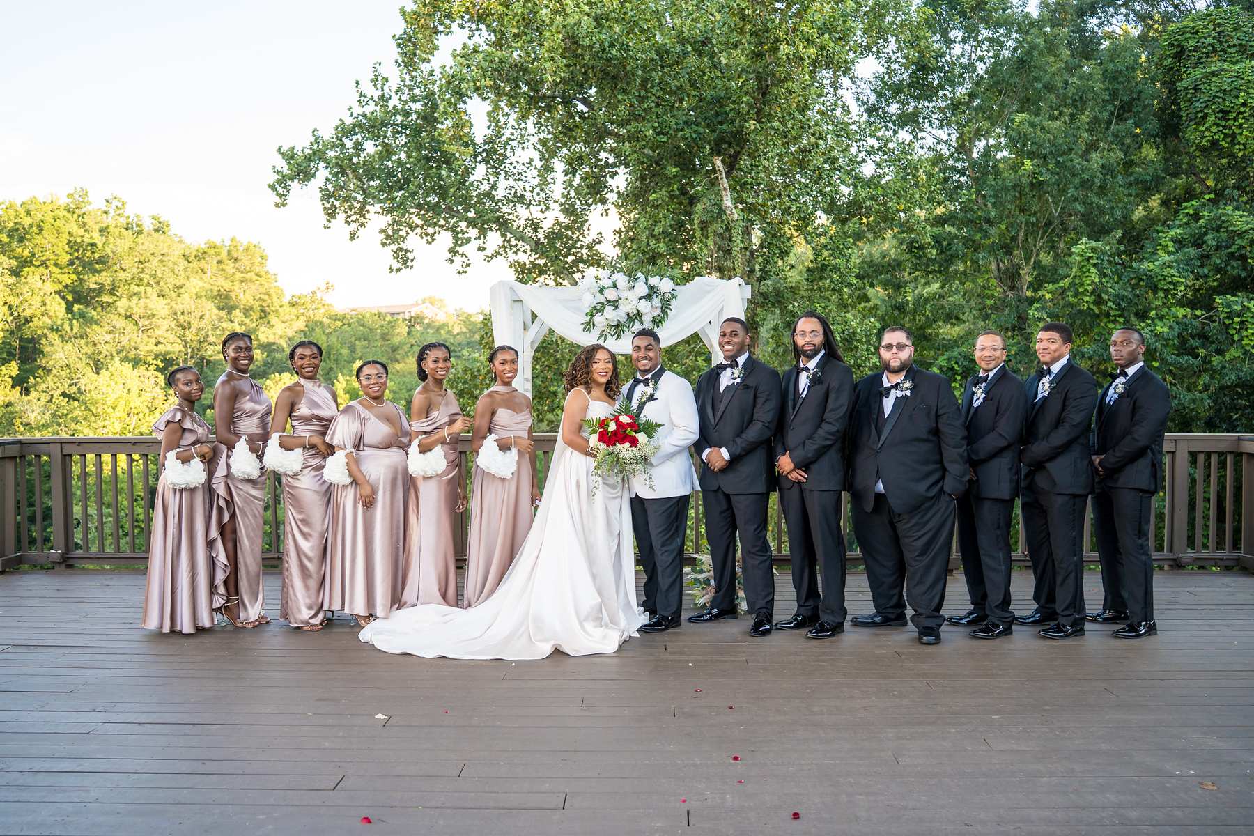 Wedding party portrait on the deck at Ivy Hall at Roswell Mill