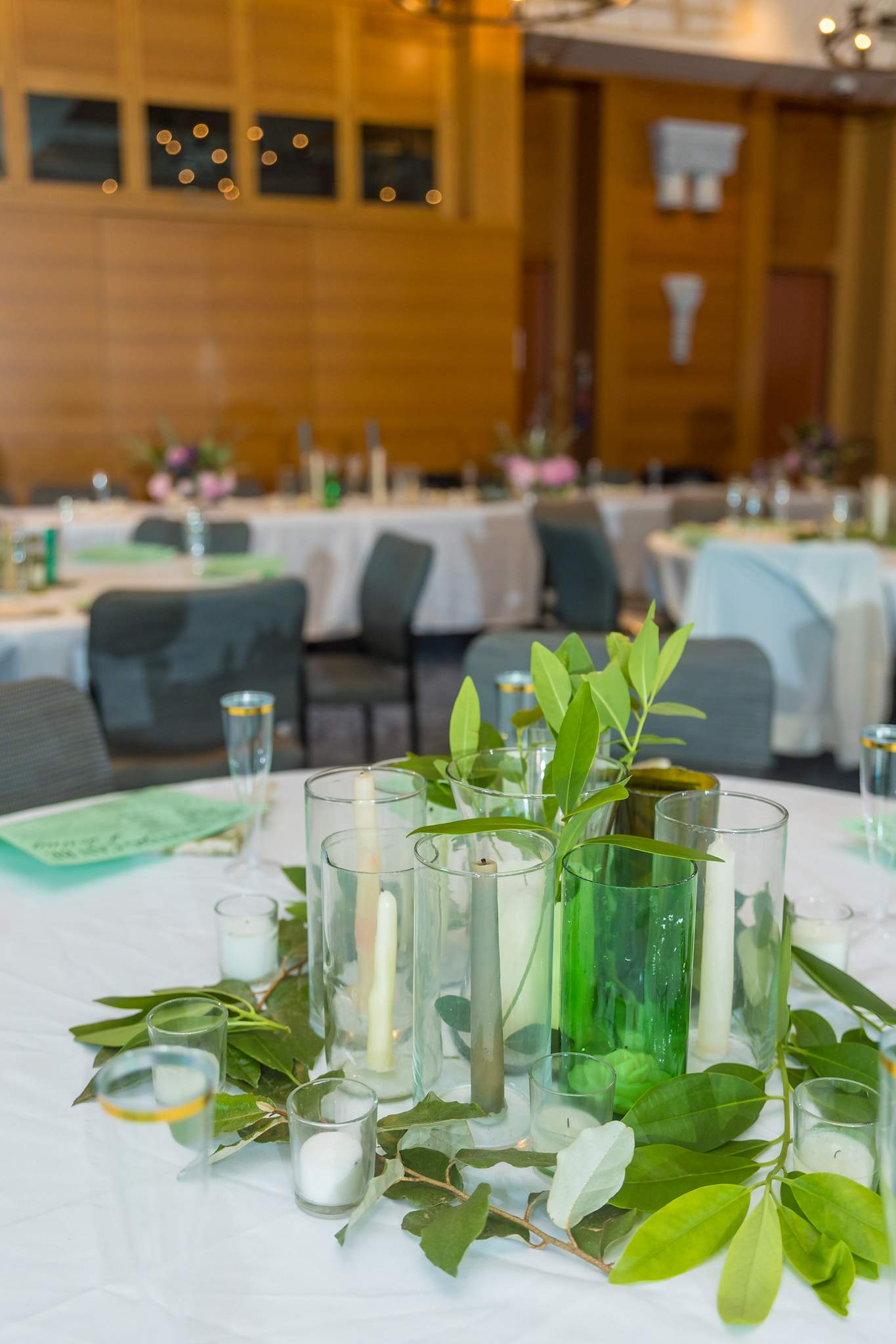 Green glass centerpiece on a reception table at the Michael C. Carlos Museum