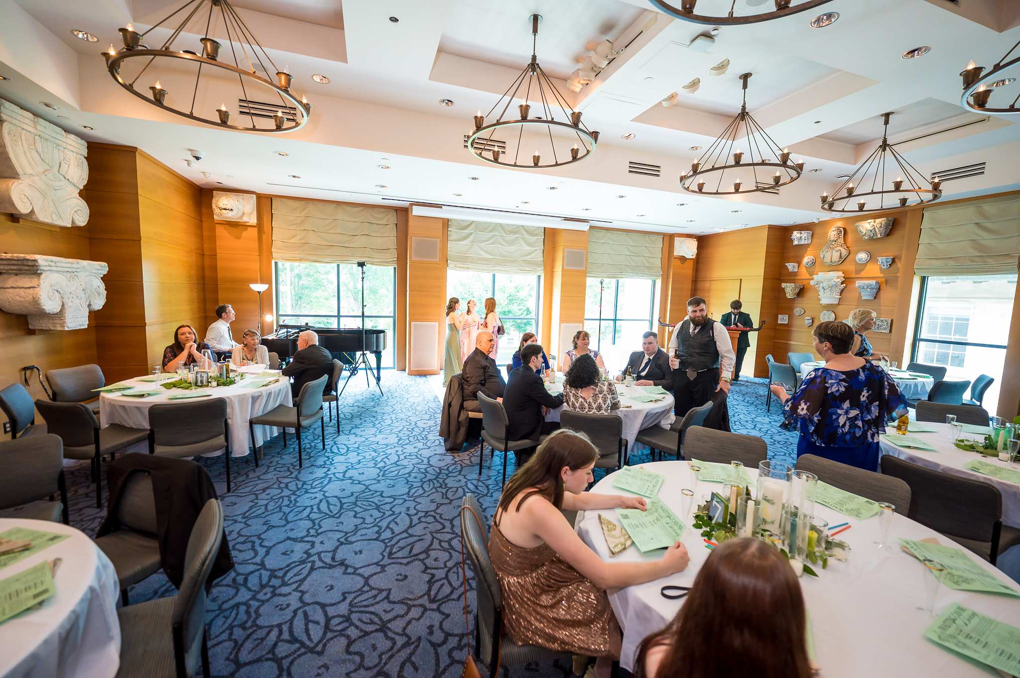 Guests gathering in Ackerman Hall at the Michael C. Carlos Museum