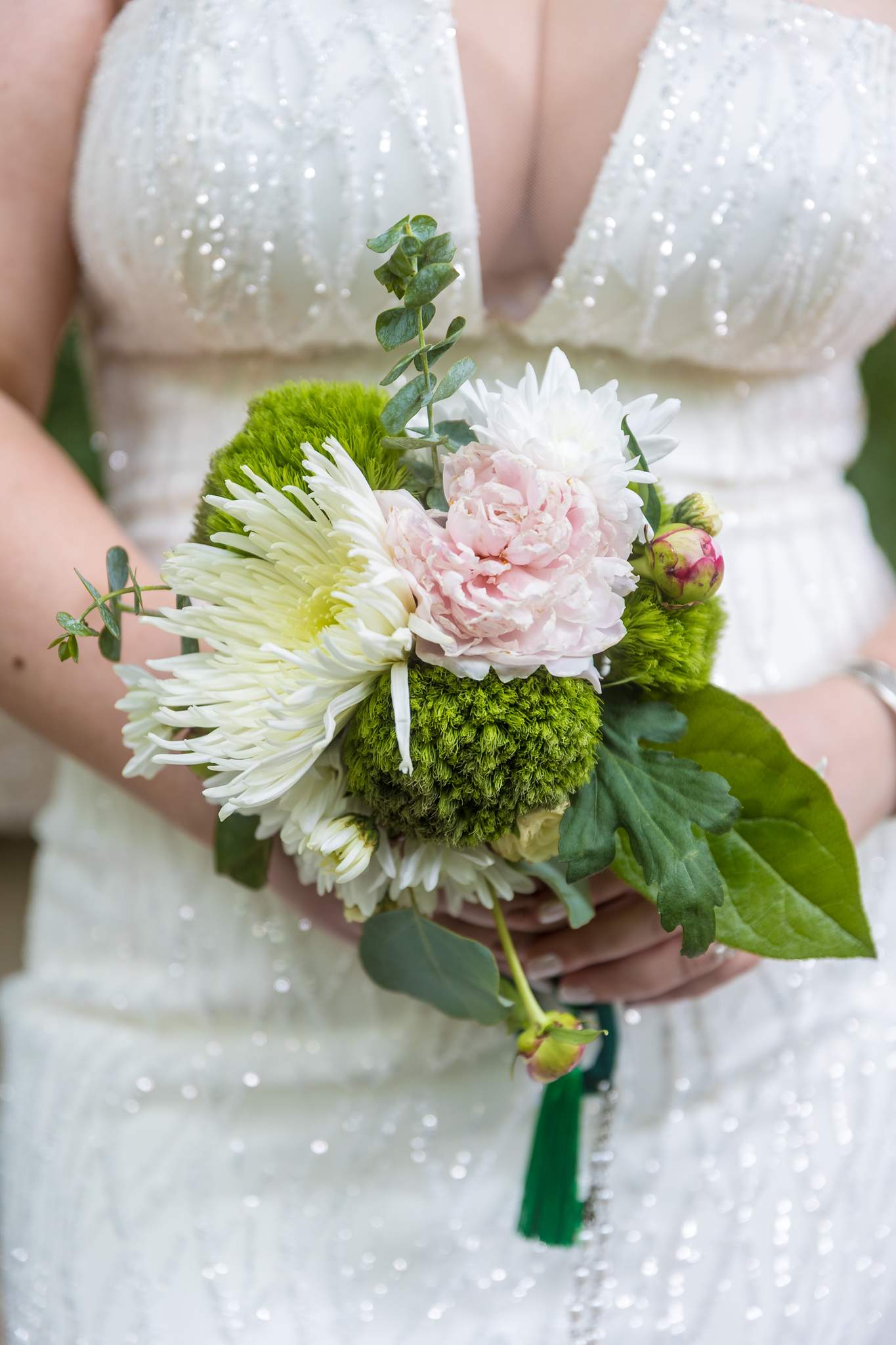 Close up of a white and pink bridal bouquet