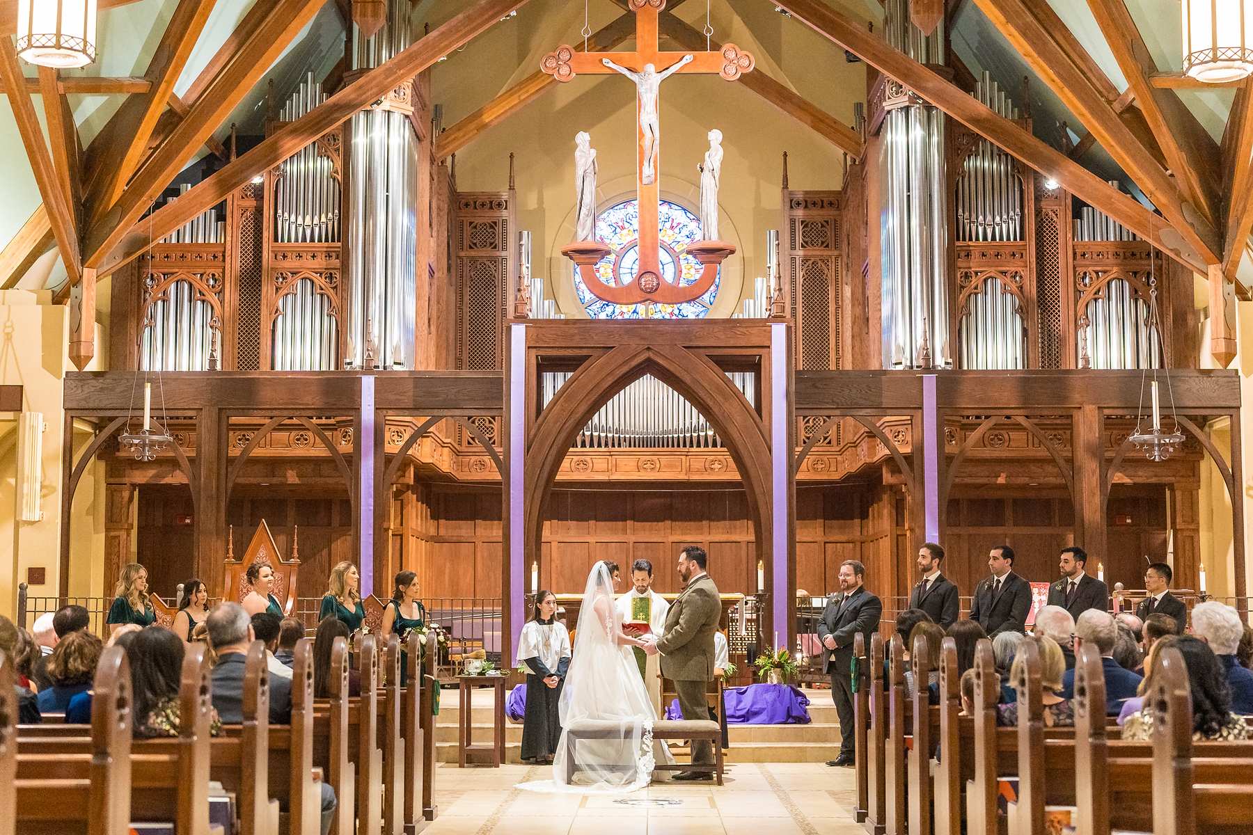Altar and new pipe organ during a wedding ceremony at Our Lady of the Assumption Catholic Church