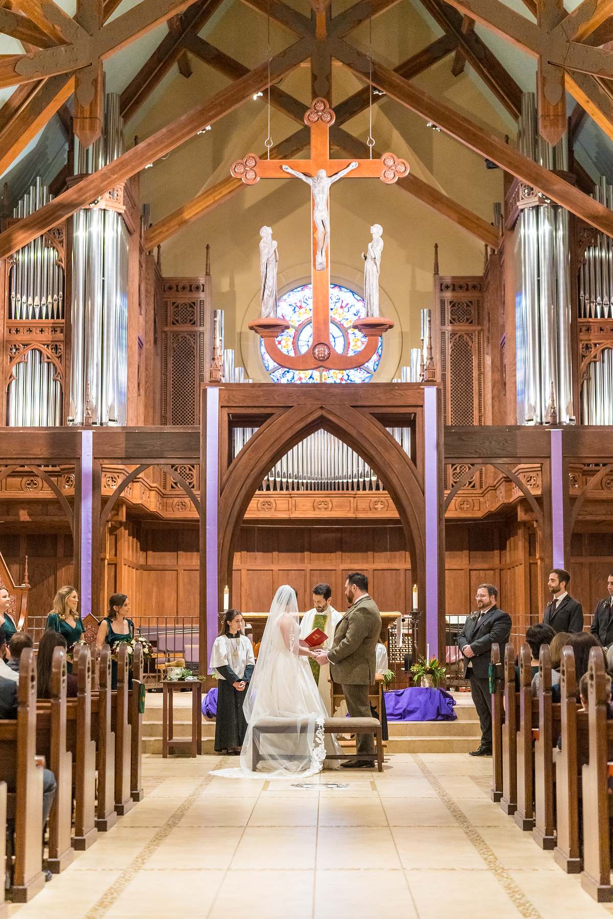 Symmetrical view of the altar and organ from the aisle at Our Lady of the Assumption