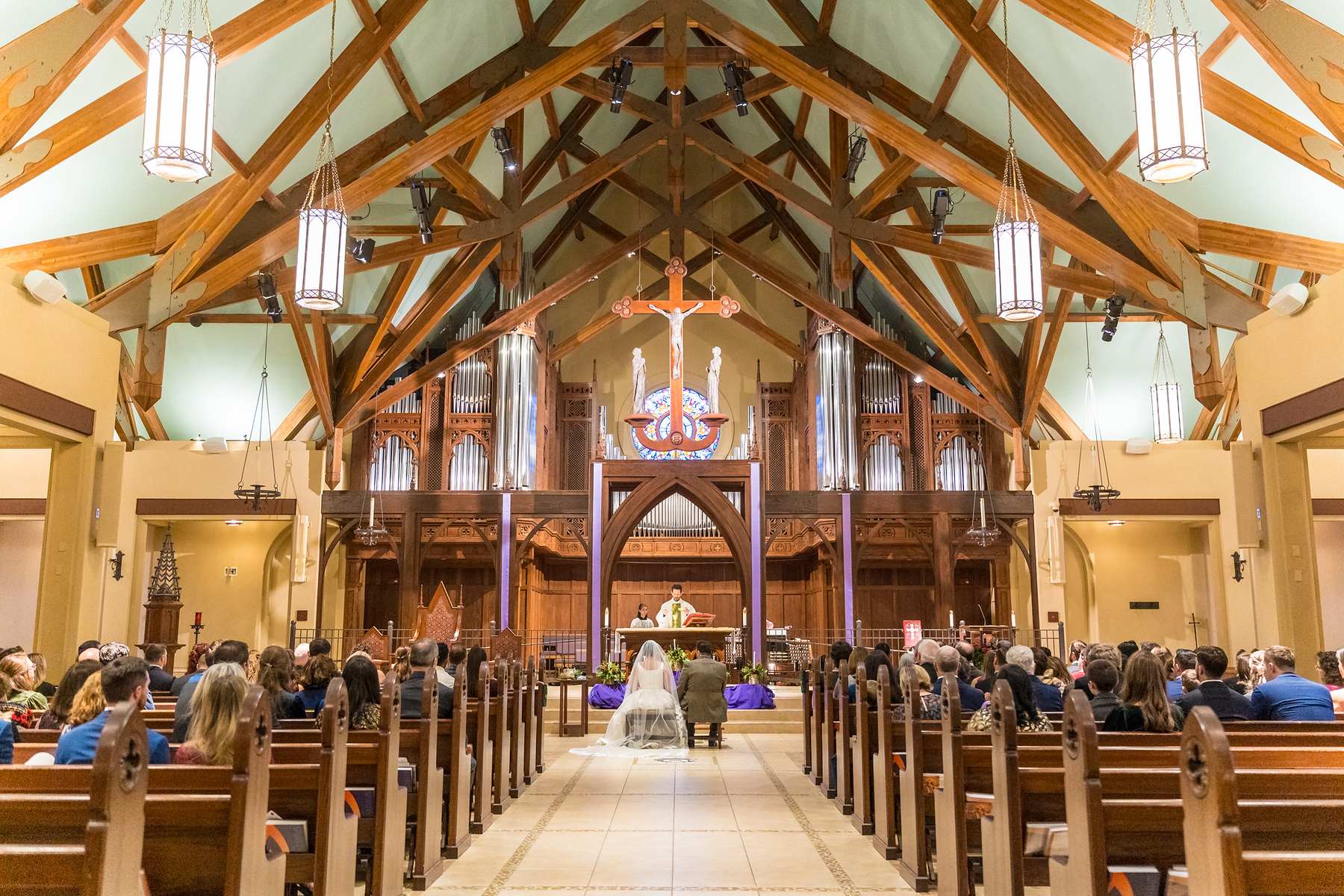 Wide view of a wedding Mass at Our Lady of the Assumption Catholic Church in Atlanta
