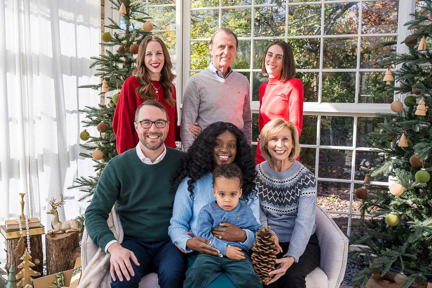 Multi-generational family Christmas portrait in the Greenhouse at Prospect Farms