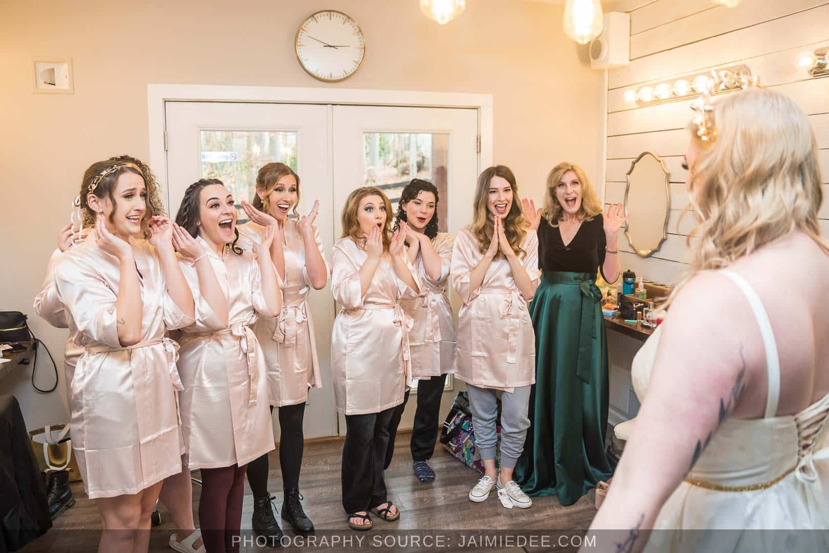 Rocky's Lake Estate Wedding Venue - getting ready in the bridal suite - first look with bride and bridesmaids in bride's suite