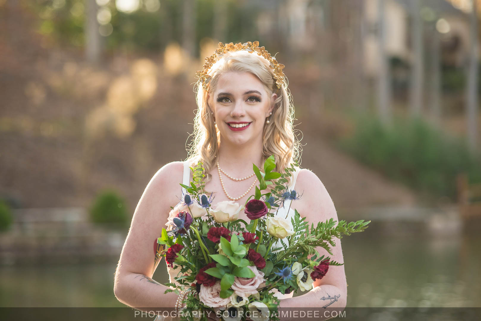 Rocky's Lake Estate Wedding Venue - Bridal Portraits - close up of bride on her wedding day holding bouquet of flowers