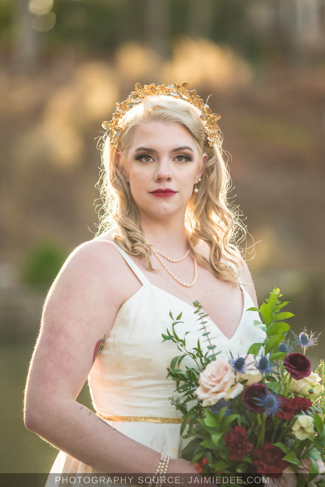 Rocky's Lake Estate Wedding Venue - Bridal Portraits - close up of bride on her wedding day holding bouquet of flowers