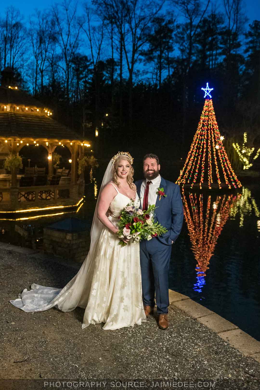 Rocky's Lake Estate Wedding Venue - bride and groom couples portrait - night time couples portraits in front of gazebo and Christmas tree