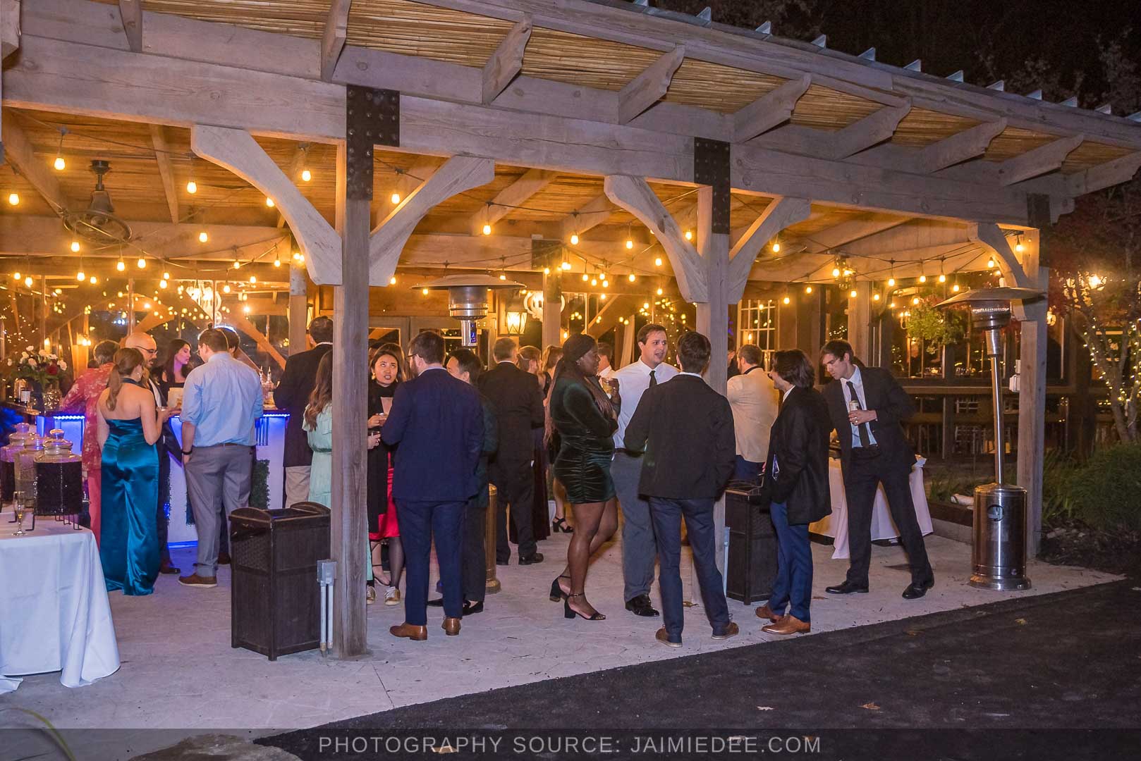 Rocky's Lake Estate Wedding Venue - reception - guests gathered in outdoor pavilion space