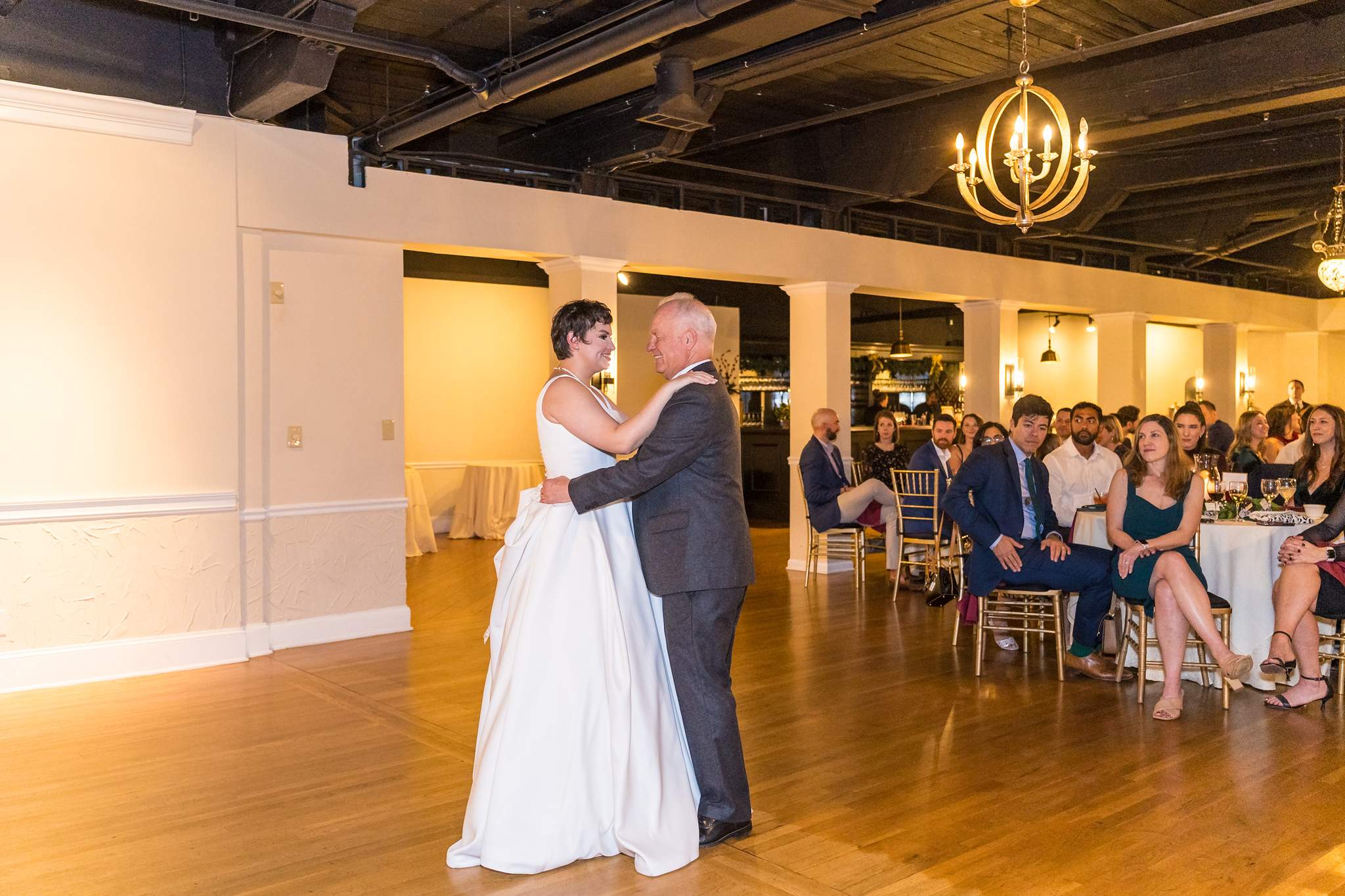 Bride dancing with a family member at Roswell Mill Club