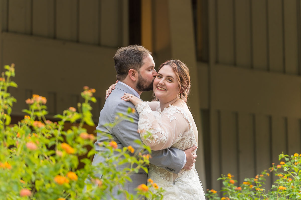 Roswell River Landing Wedding Photos of Landscaping with Orange Butterfly Bushes Blooming in the Fall