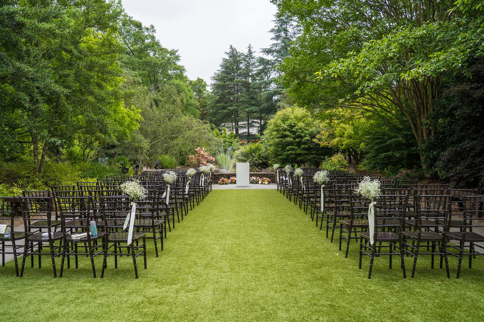 Ceremony lawn with chairs and a grass aisle at Shiloh Gardens Special Events Venue
