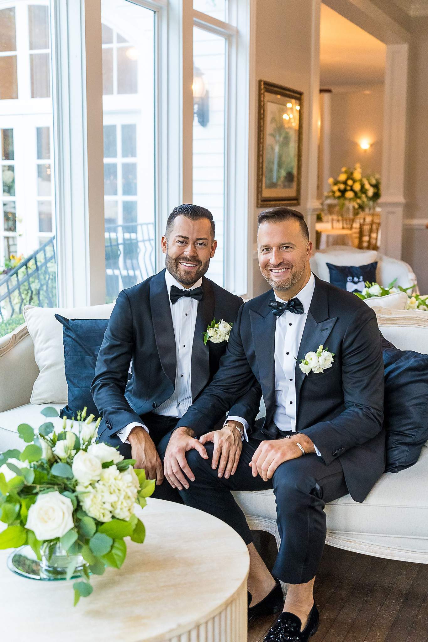 Couple seated together in an elegant parlor at The Cedars in Acworth