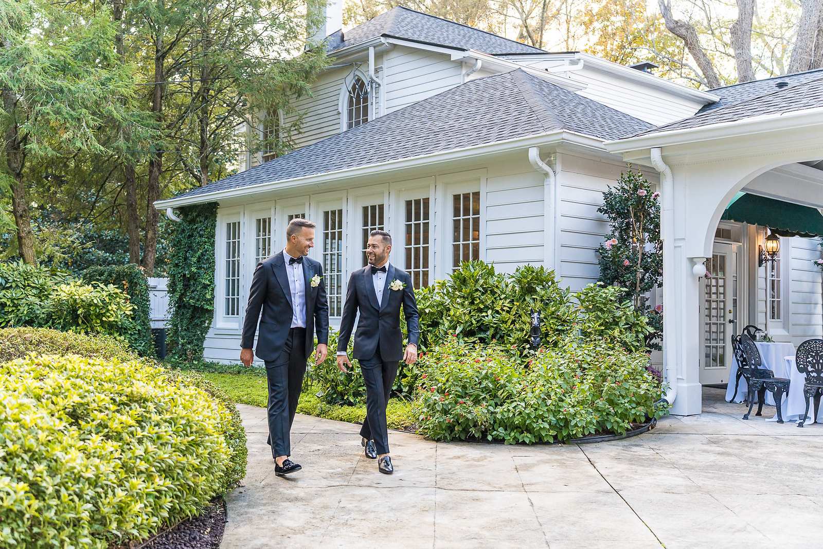 Couple walking along the garden path at The Cedars in Acworth, formerly Cedar Plantation
