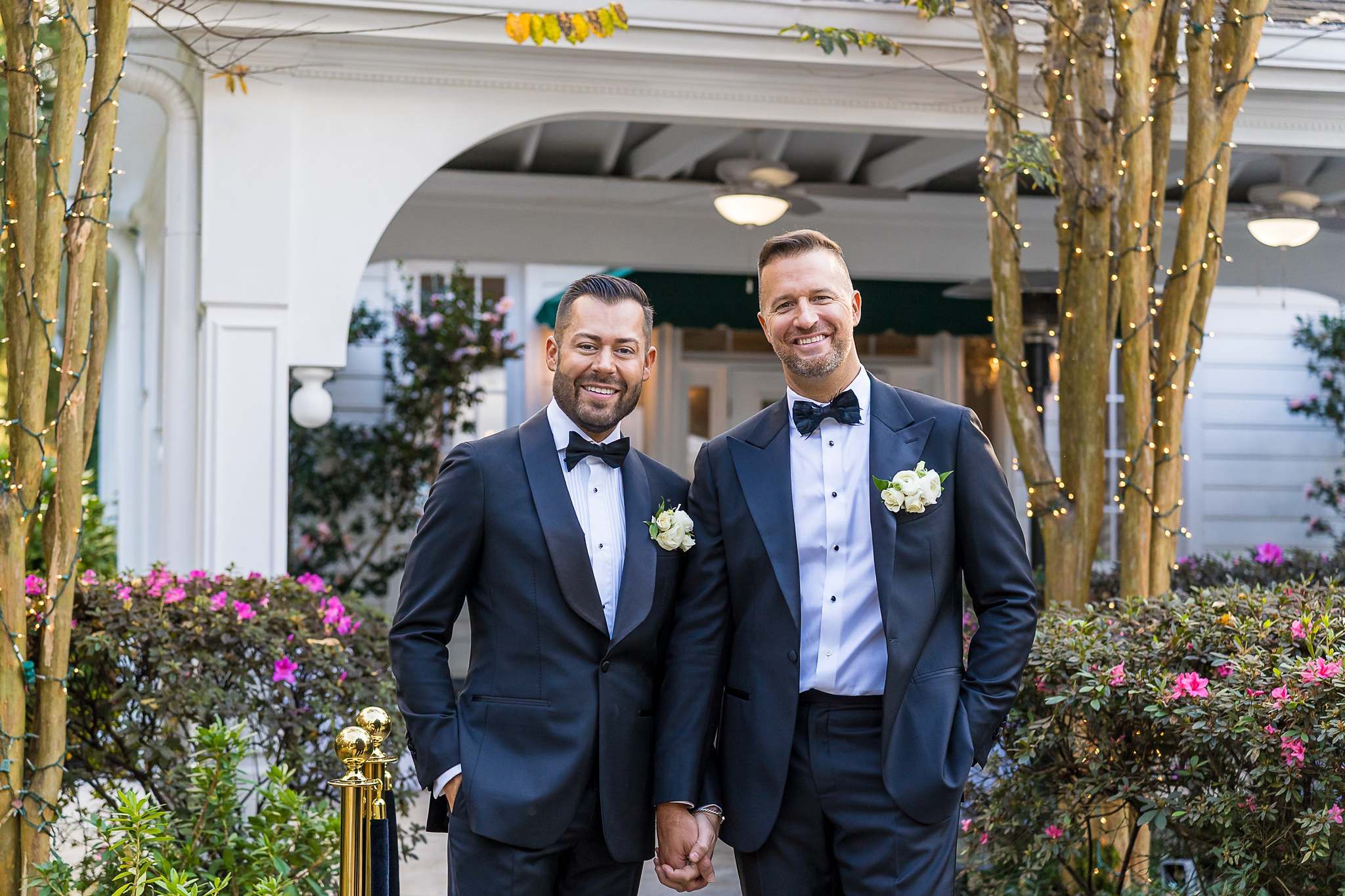 Couple portrait under the covered entrance at The Cedars in Acworth