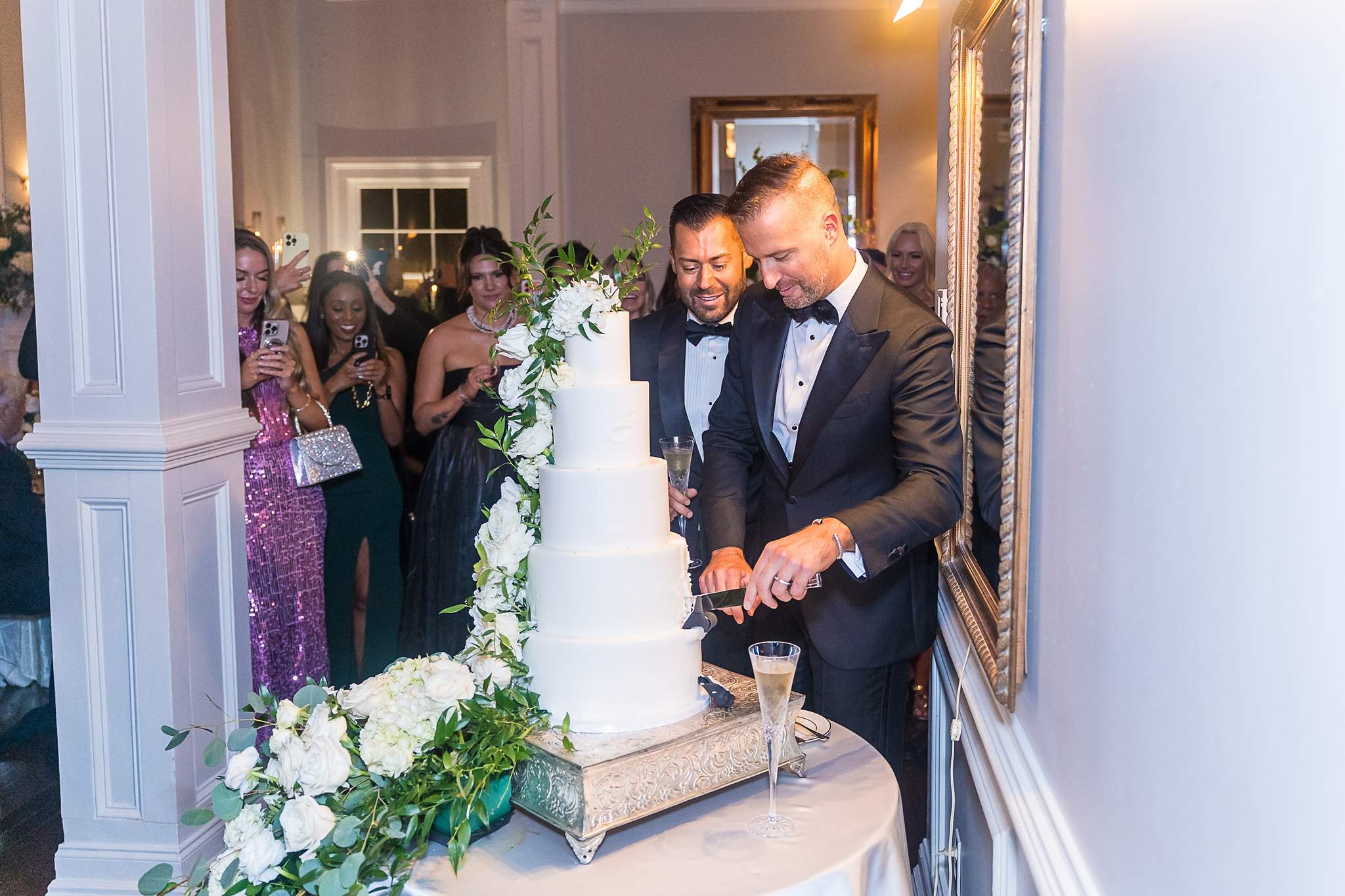 Couple cutting their cake inside The Cedars in Acworth